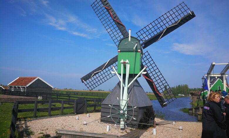 Photo of Zaanse Schans windmills village in Netherlands- Windmill De Zoeker